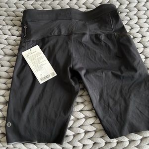Lululemon surge warm Half tight Ten inch. Size large tags still on